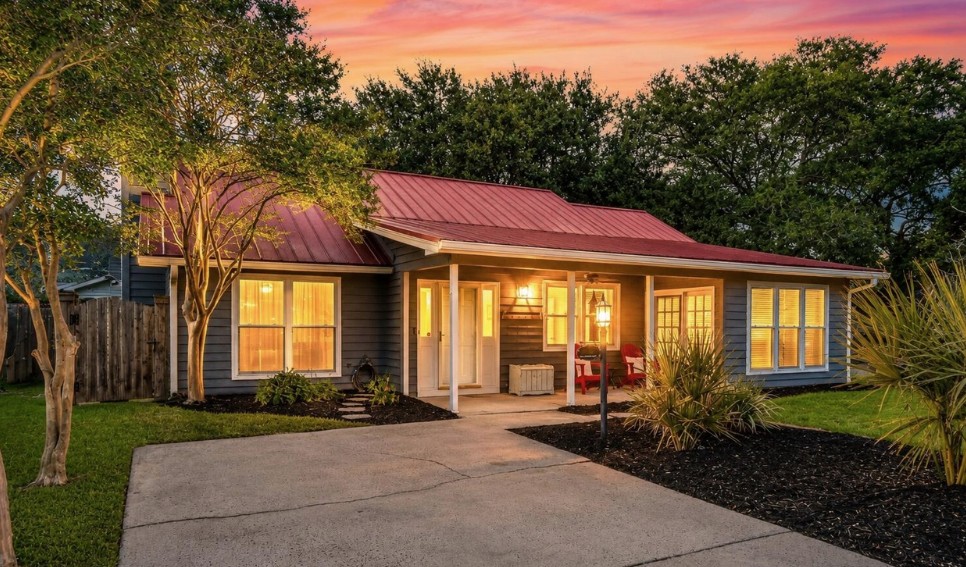 Single-story ranch home at dusk, a senior-friendly aging in place home style with no interior stairs